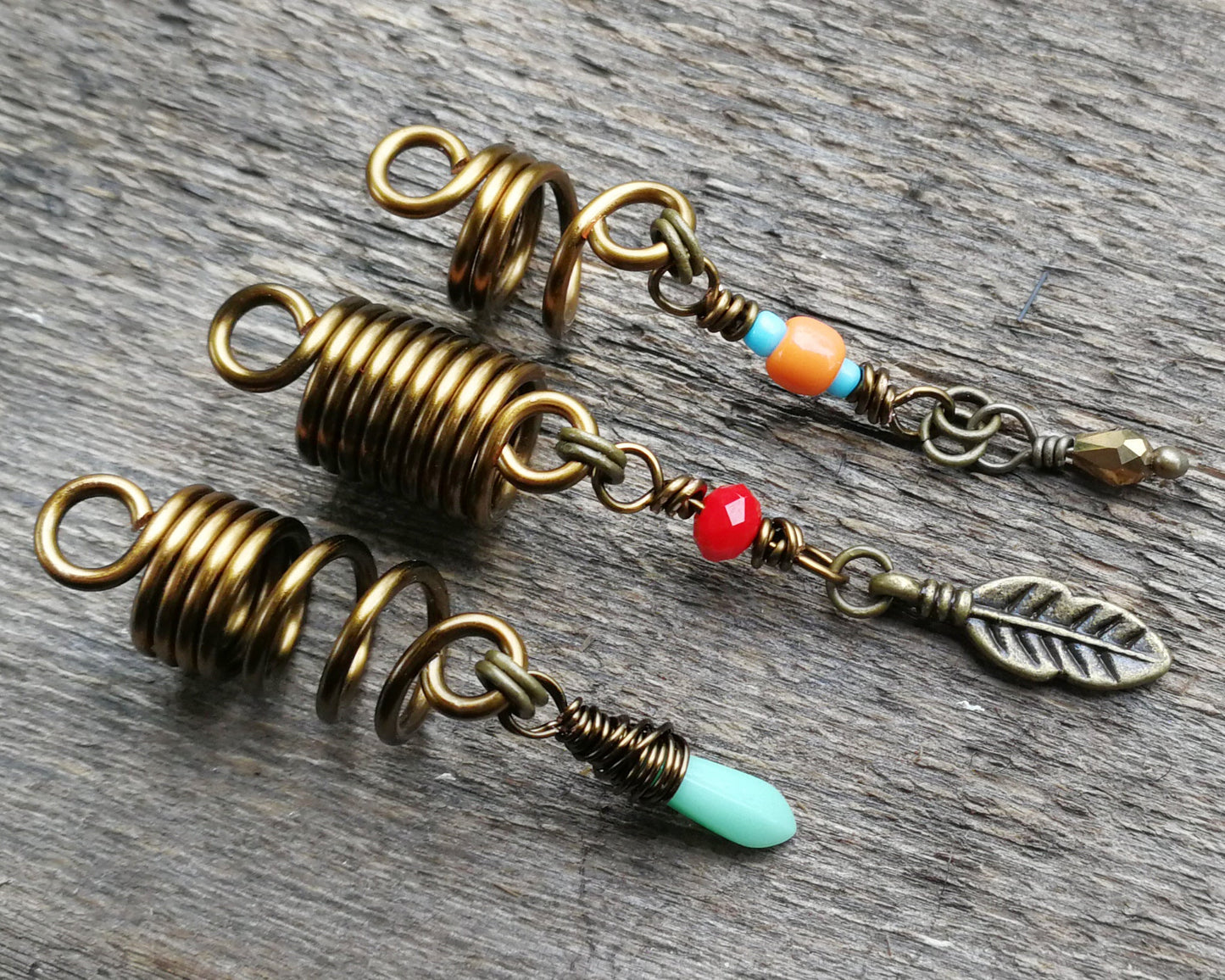 Southwestern hair jewelry set of 3 on a wood background.