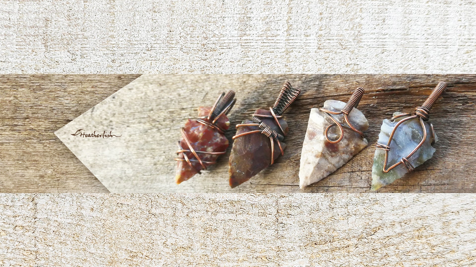 Banner image showing heatherfish arrowhead pendants on a wood background.