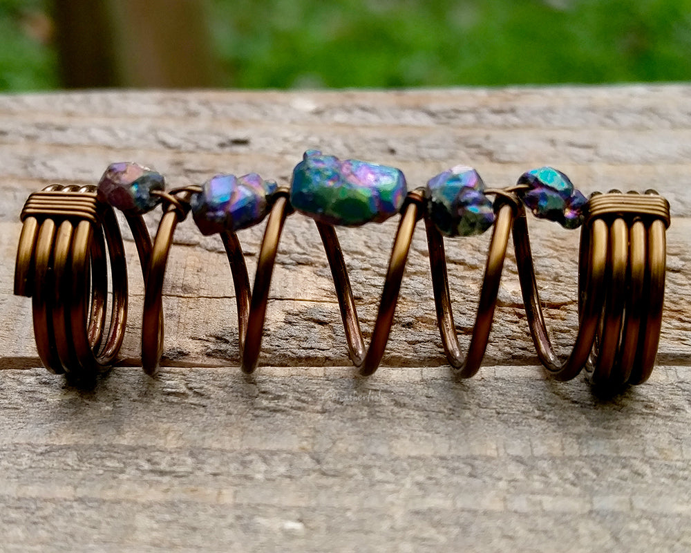 A side view of a Titanium Quartz Dread Bead.