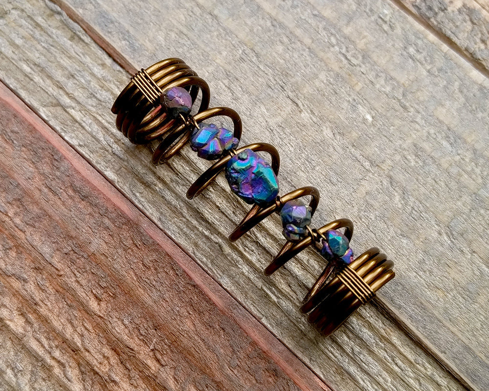 A top view of a Titanium Quartz Dread Bead.