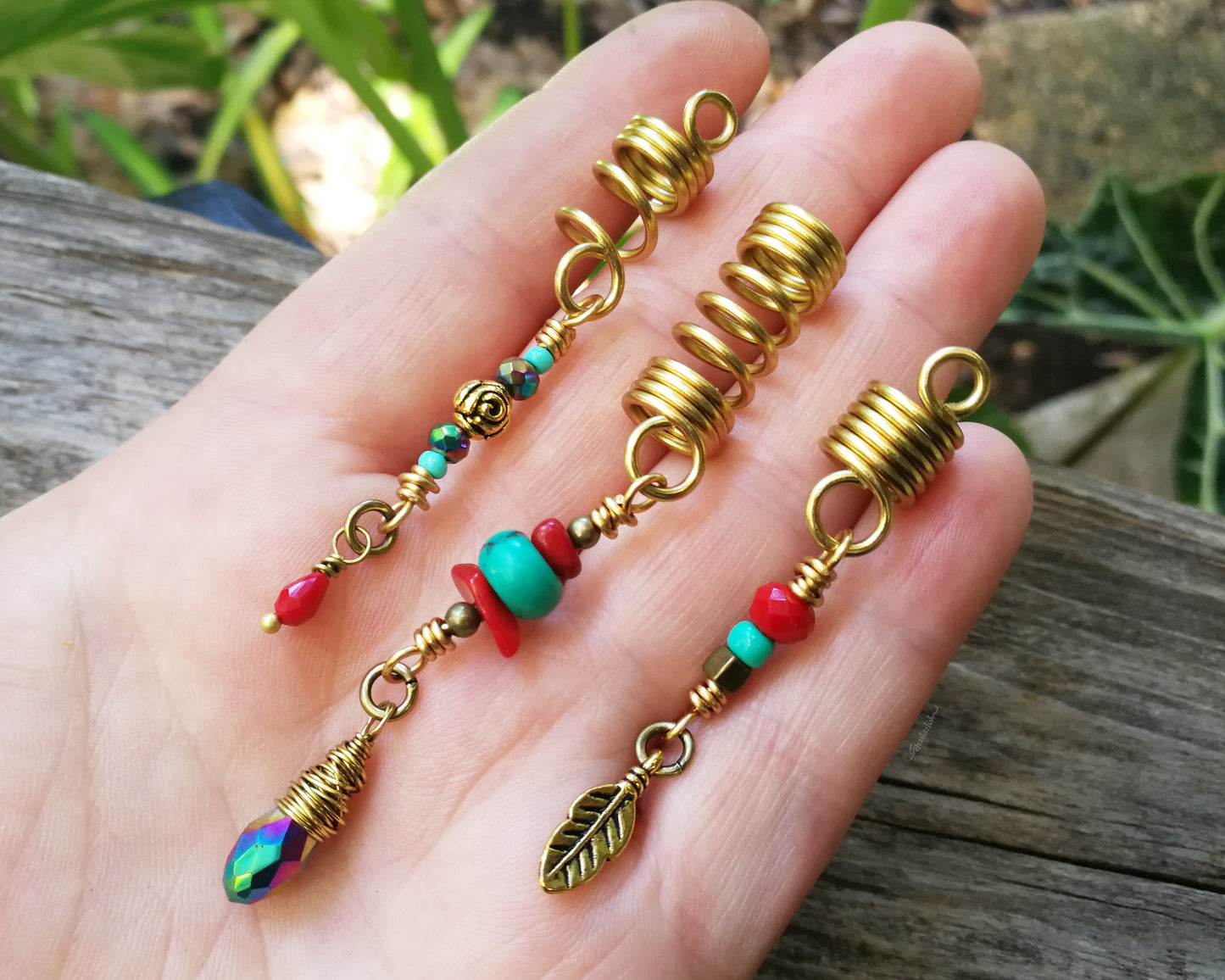 A top view of Fun Funky Dread Beads Set of 3 in hand.