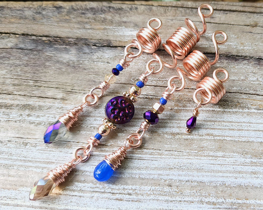 Rose Gold purple Loc Beads, Set of 4 on a wood background.