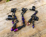 Purple and Black Loc Beads, Set of 5 on a wood background.