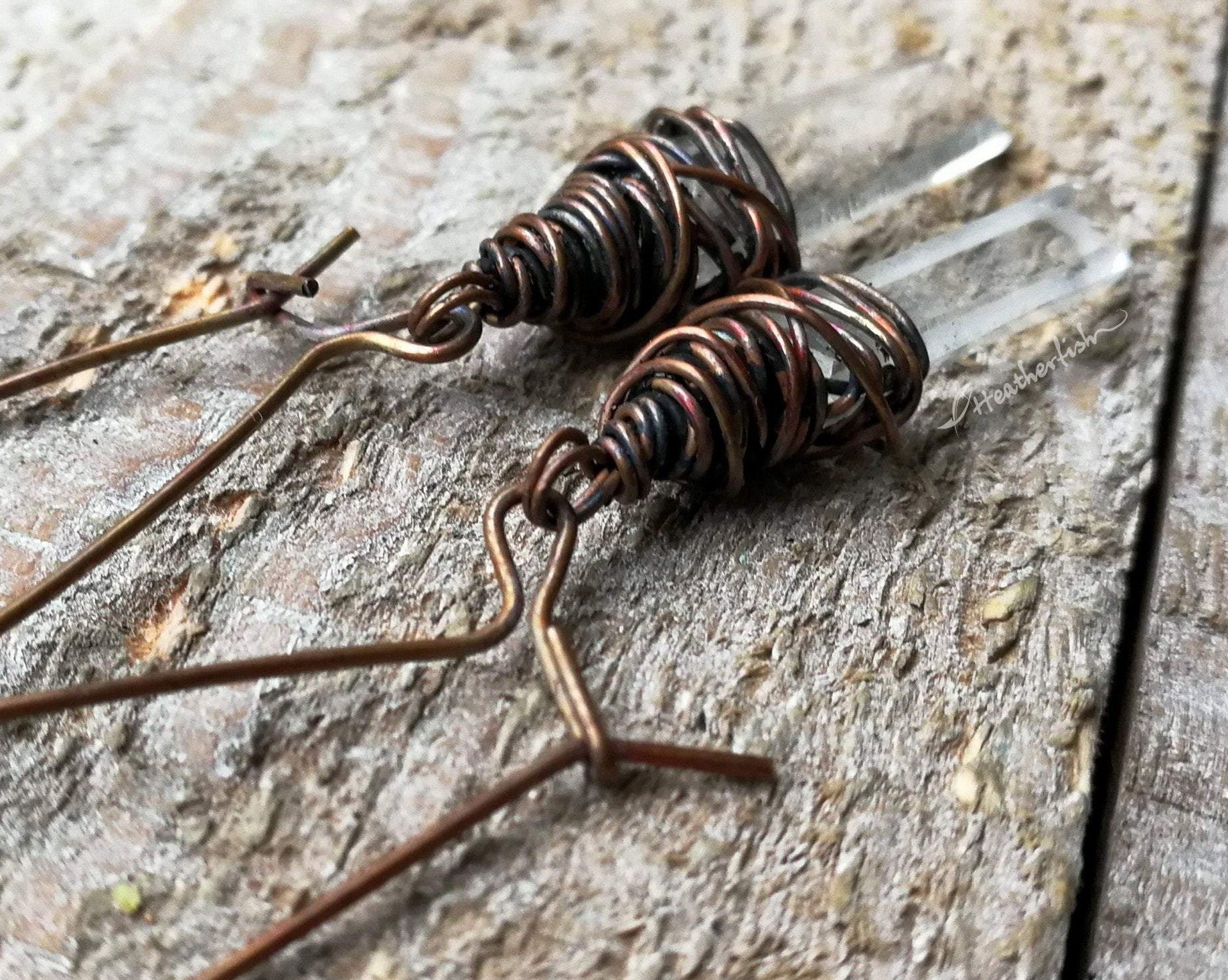 A Pair of crystal earrings.  Zoomed in to see ear wires.