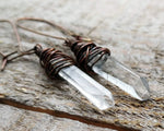 A pair of crystal earrings.  Zoomed in to see Arkansas Quartz. 