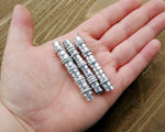 Top view of Extra Long Loc Beads Set of 3 in hand.