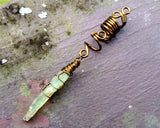 A top view of a Green Kyanite Dread Bead.