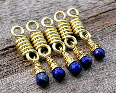 A close up view of Lapis Lazuli Sister Loc Beads Set of 5.