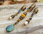 Rainbow, Yellow, Set of 3 Loc Beads on a wood background.