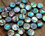 Random abalone beads used for design.