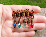 A top view of Rainbow Loc Beads Set of 5 in hand.