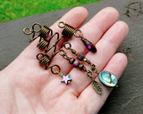 Set of 4 dread beads in hand