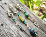 A top view of Heatherfish Signature Dread Beads Set of 3.