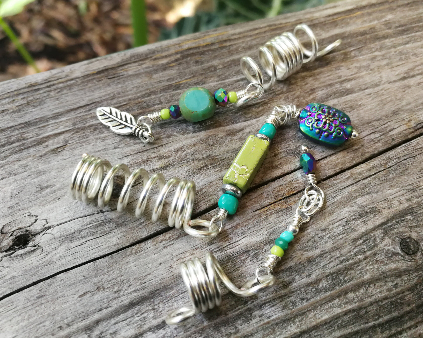 A top view of Heatherfish Signature Dread Beads Set of 3.