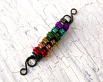 A back view of a Rainbow Pride Dread Bead.