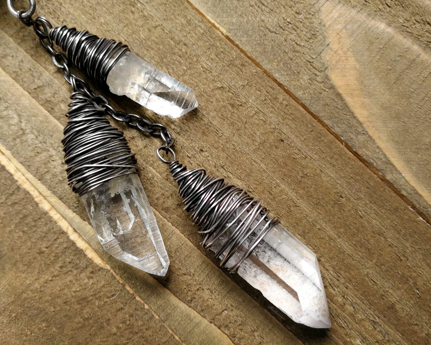 Close up of crystals with Ivory Inclusions on wood background.
