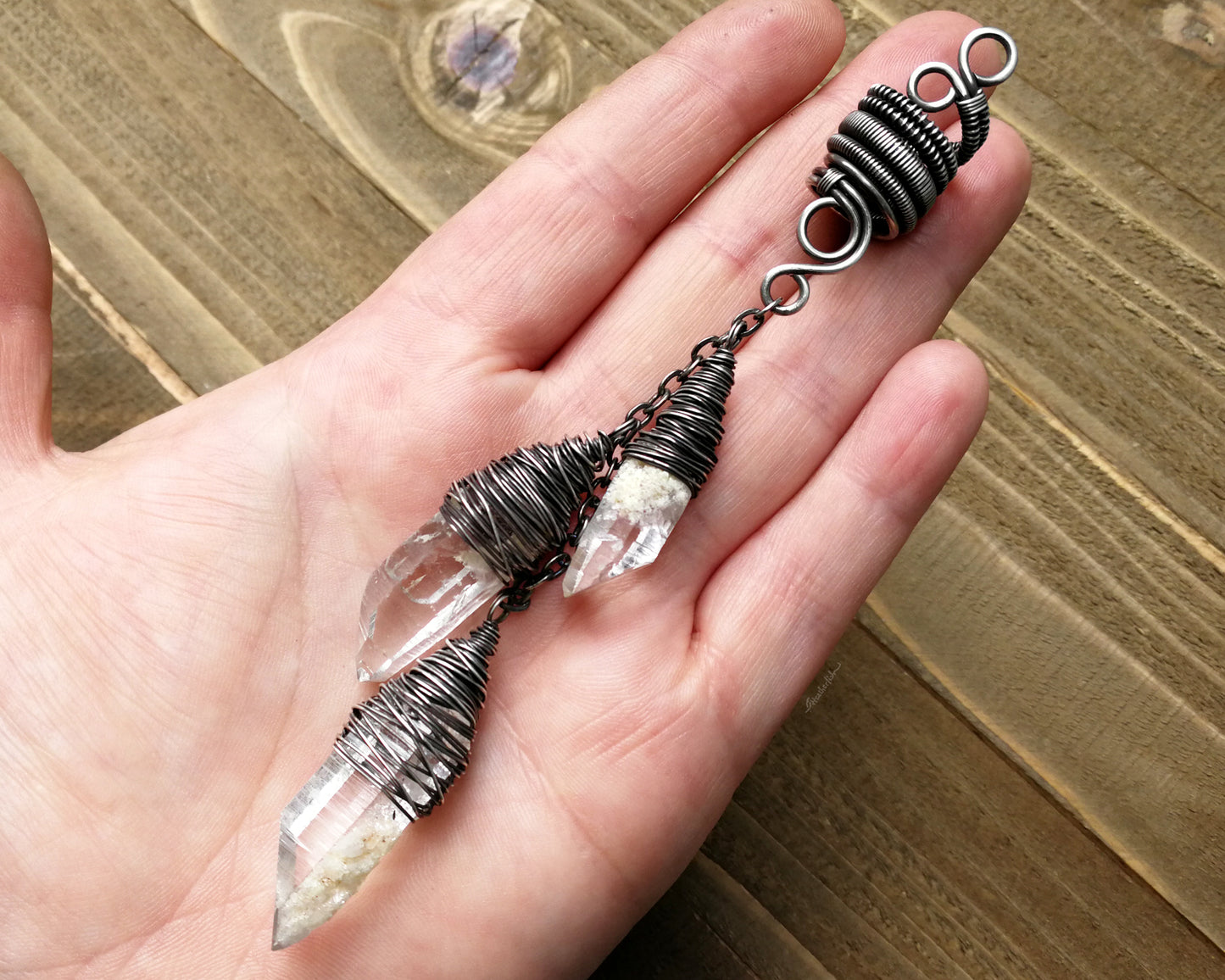 Silver Crystal Dread Bead, Ivory Inclusions held in hand.