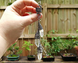 Silver Crystal Dread Bead, Ivory Inclusions held in hand.
