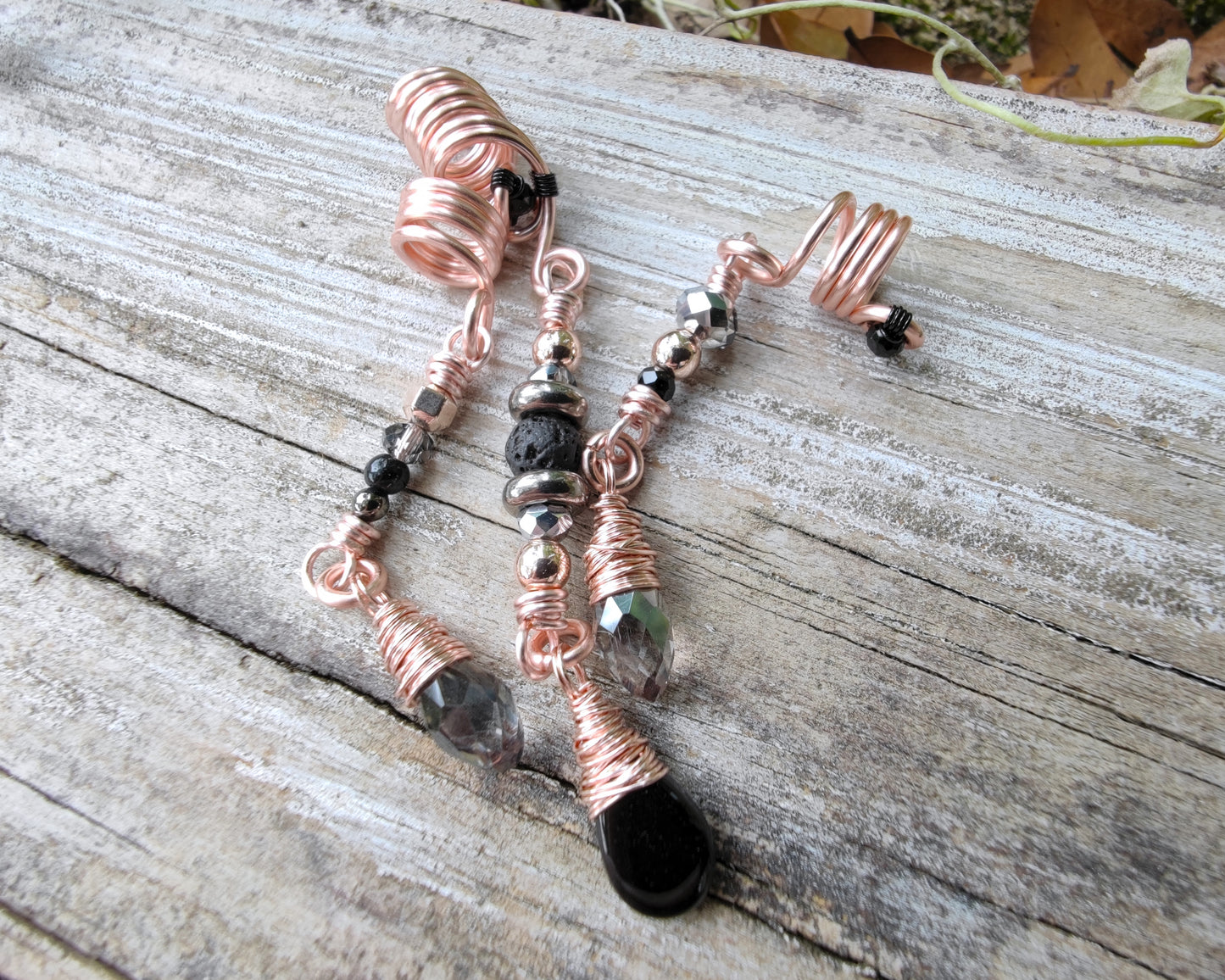 Rose Gold Black Loc Beads, Set of 3, on wood background.