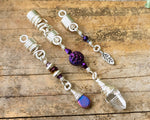 Quartz Set of 3 Dread Beads, silver color option, on a wood background.