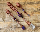 Quartz Set of 3 Dread Beads, antique copper color option, on a wood background.