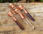 Purple, Iron Quartz Loc Beads, Set of 3 on a wood background.