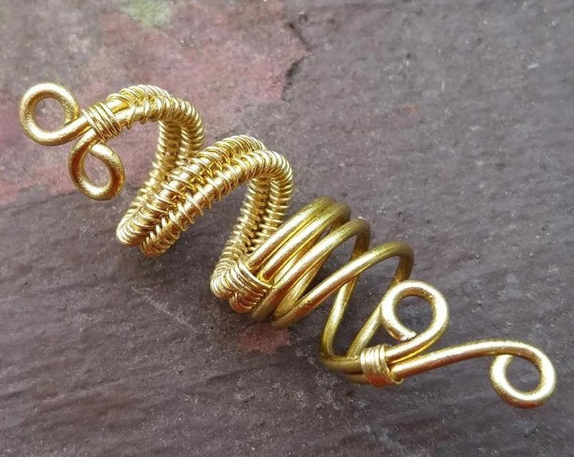 Close up of Artisan Woven Dread Bead 