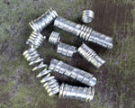 A top view of Stylized Dread Beads Set of 10.