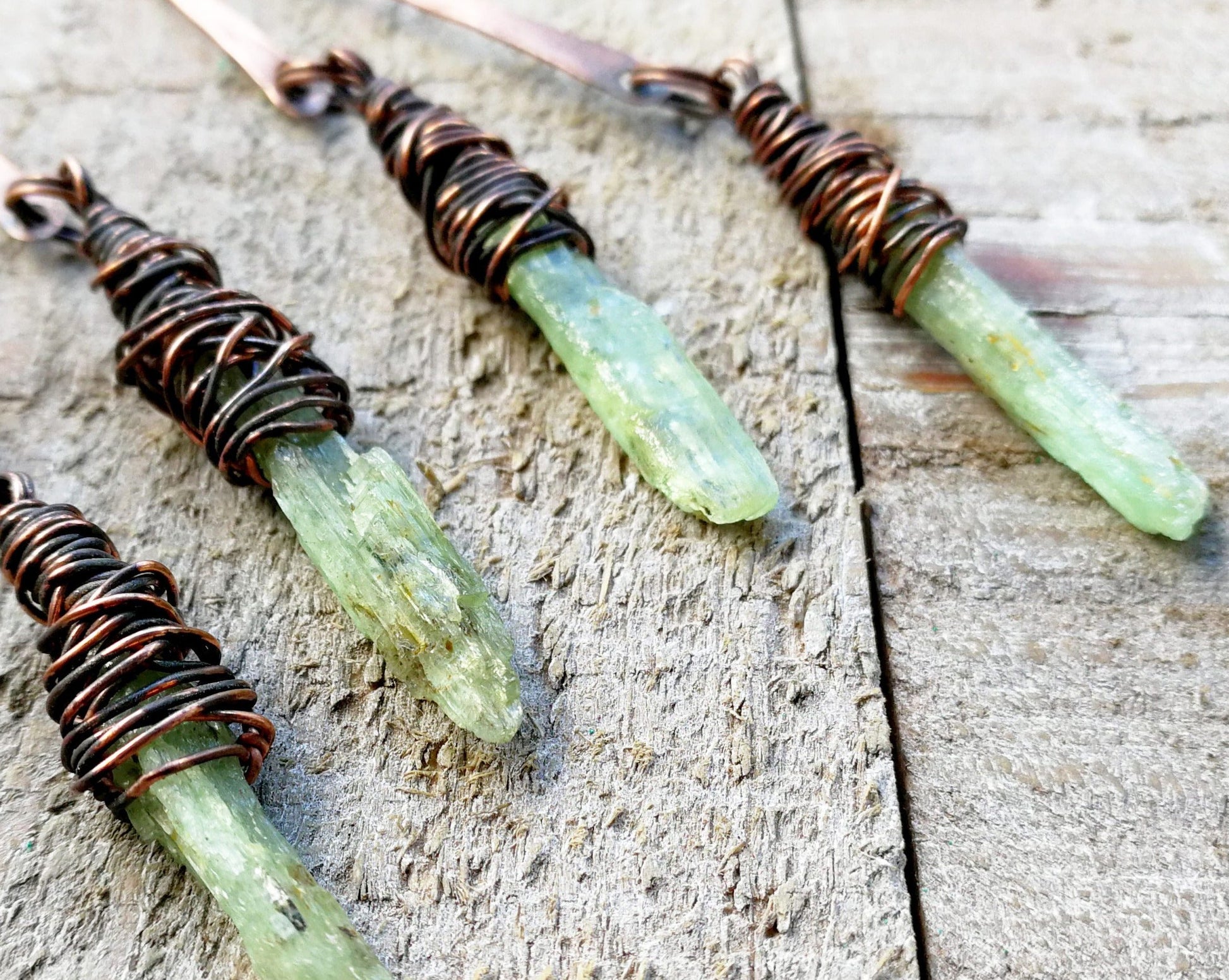 A close up of the Boho Green Kyanite Earrings.