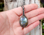 Blue Labradorite Pendant, Filled Silver held in hand to show scale.