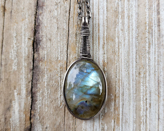 Blue Labradorite Pendant, Filled Silver on wood background.