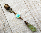 A back view of a Green Kyanite Squiggle Loc Bead.