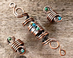 A close up of Copper Turquoise Dread Beads Set of 3.
