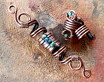 A close up top view of Copper Turquoise Dread Beads Set of 3