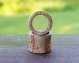 A close up front view of Handmade Antler tunnels.