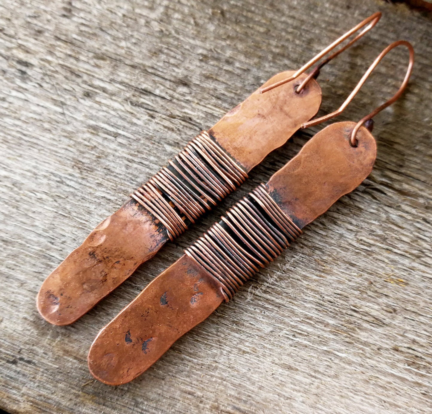 A back view of Turquoise Hammered Copper Erarrings.