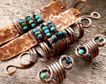 A comparison of Copper Turquoise Dread Beads Set of 3 beside a matching earrings. 