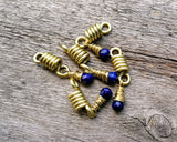 A top view of Lapis Lazuli Sister Loc Beads set of 5.