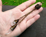 A top view of Double Crystal Woven Dread Bead in hand.