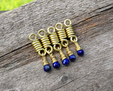 A top view of Lapis Lazuli Sister Loc Beads set of 5 in a row.