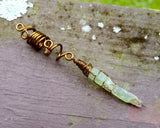 A back view of a Green Kyanite Dread Bead.