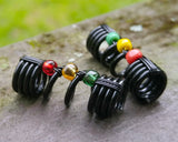 A close up view of One Rasta Dread Bead with options in Glass Bead Type.