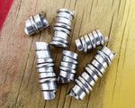 A top view of Hammered Dread Beads Set of 6.