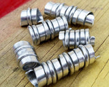 A close up view of Hammered Dread Beads a set of 6.