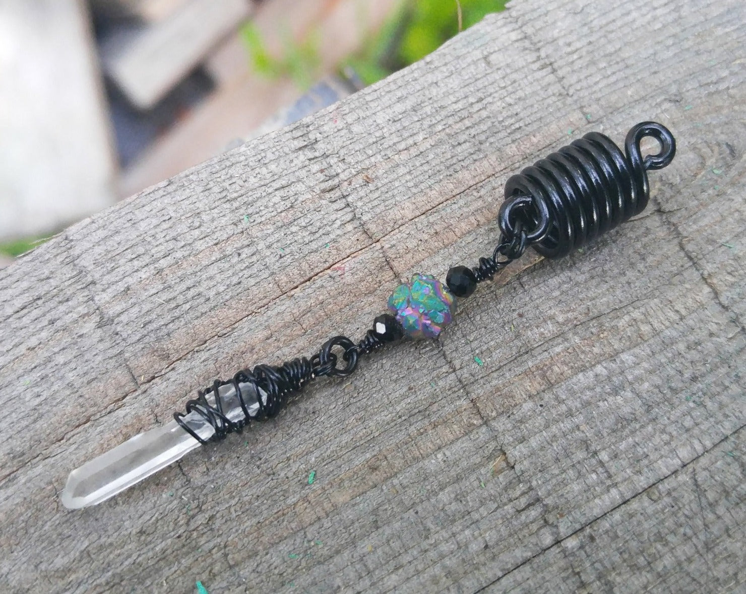 A Black Crystal Loc Bead showing the detail in the Crystal.